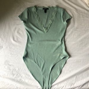Teal body suit with lace neckline